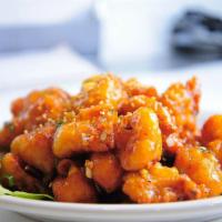 23. Imperial Sesame Chicken · Lightly battered crispy chicken, coated with chef's special sauce.