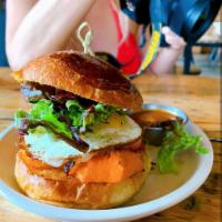 Vedge Sandwich · Smoked sweet potato, sunny side up egg, sharp cheddar and baby greens on sourdough brioche b...