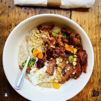 Heirloom Grit Bowl  · Breakfast sausage, bacon or chicken sausage, creamy cheddar grits, poached farm egg, roasted...