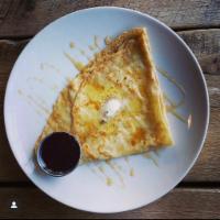 Sweet White Crepe · All purpose flour crepe with local honey, chamomile butter, and house-made jam.