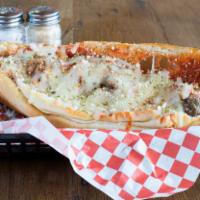 Meatball Parmesan Hot Sub · Meatballs with marinara sauce and melted mozzarella. Includes bag of chips.