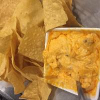 Buffalo Bob's Chicken Dip · We season and roast fresh chicken and add some spice for a little extra heat. Served with fr...