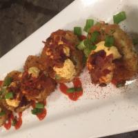 Deviled Eggs · Lightly dusted in panko breading and flash deep-fried. We load them with Sriracha mayo filli...