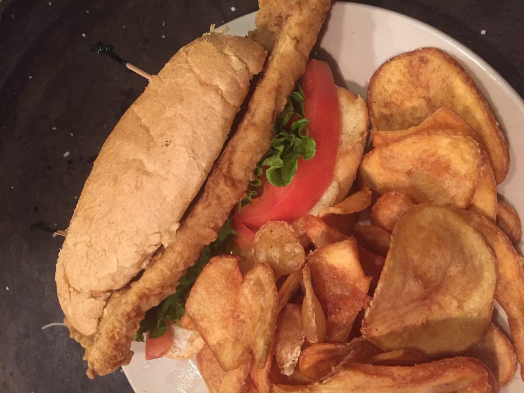 Walleye Sandwich · Grilled or Fried. Served with with tomato, lettuce and a side of Tabasco lime sauce. Comes with FireSide thick-sliced potato chips.
