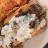 Philly Cheese Sandwich · Shaved Ribeye or Grilled Chicken topped with grilled peppers and onions. Steak Philly is ser...