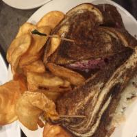 Best Reuben Ever Sandwich · Hand-shaved corned beef brisket topped with seasoned sauerkraut, Swiss cheese and Thousand I...