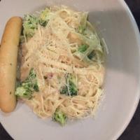 Classic Fettuccine Alfredo Pasta · Creamy Alfredo sauce with Parmesan cheese and hints of garlic and onions smothering fettucci...