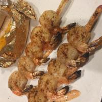 Grilled Shrimp · flame-grilled shrimp served with our spicy Southwest fire sauce. Comes with a salad and 1 si...