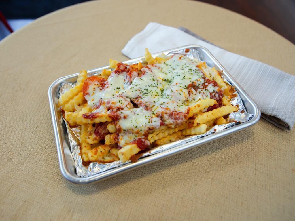Pizza Fries · Melted mozzarella, topped with pepperoni and pizza sauce.