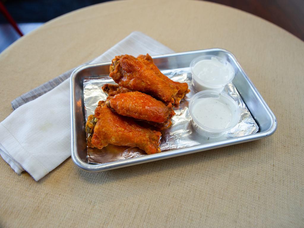 Traditional Wings · Comes with ranch or blue cheese.