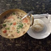SO02 Tom Kha Large Bowl (Coconut Soup) ต้มข่าชามใหญ่ · Tom Kha Paste, Coconut Milk, Mushrooms, Green and White Onion, Cilantro, Tomato – Served wit...