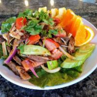 SA04 Yum Neua Rod Ded (Thai Beef Salad) ยำเนื้อ  · Slice Beef, Green and White Onion, Tomato, and Cucumber with House Sauce. 