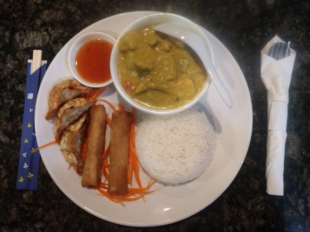 LS10 Yellow Curry Combo Platter แกงเหลืองจานคอมโบ · Yellow Curry paste, Potato, Pineapple, Carrot, and Onion, Rice, 2 Egg Rolls, and 3 Pot Stickers
