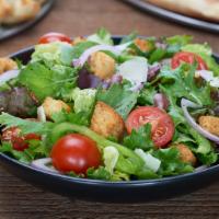 Garden Salad · Romaine hearts, spring mix, red onion, green pepper, black olives, tomatoes, croutons and Pe...