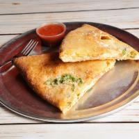 NY Philly Calzone · House made dough stuffed with 100% whole milk mozzarella cheese, fresh ricotta, sausage, gre...
