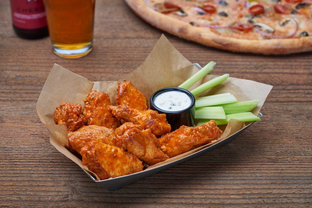 BBQ Wings · Oven-baked bone-in wings with BBQ sauce and choice of cool dip on the side.