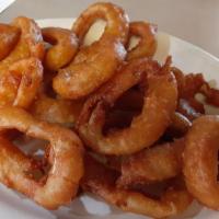 Onion Rings  · Specialty fries and rings. Sweet Spanish onions cut thick, beer-battered, and deep-fried.