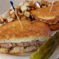 Patty Melt  · Charbroiled burger on rye with Swiss cheese and grilled onions. Served with American Fries o...