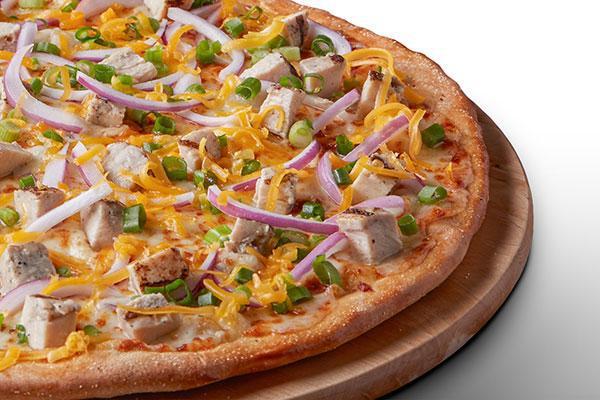 California Garlic Chicken Pizza · Signature Garlic White Sauce base on our Original Crust, topped with Mozzarella and Cheddar Cheeses, All-Natural Grilled Chicken, Red Onions, and Green Onions.