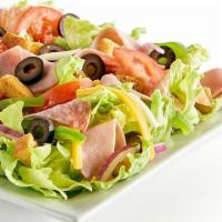 Antipasto Salad · Iceberg lettuce, bell peppers, red onion, black olives, Canadian style bacon, Italian dry sa...