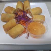 A1. Fried Egg Rolls · 4 pieces. Shredded cabbage and carrot with glass noodles wrapped in pastry paper and deep-fr...