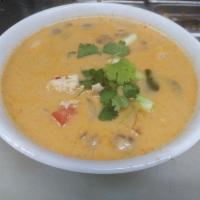 A12. Tom Kha Soup · Coconut milk based soup with cilantro, galangal, kaffir lime leaves, mushrooms, onion, tomato.