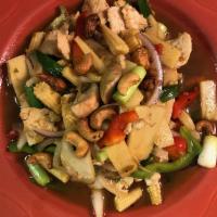32. Pad Himapaan · Cashew nuts stir-fried in our house garlic sauce with baby corns, bamboo shoots, bell pepper...