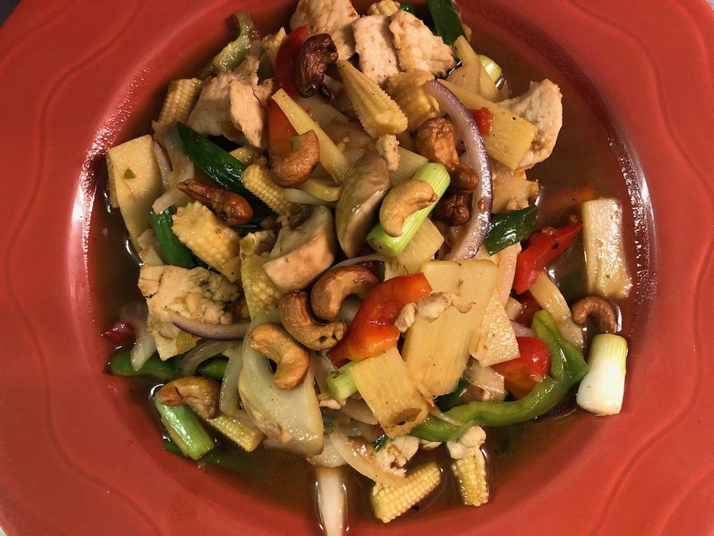32. Pad Himapaan · Cashew nuts stir-fried in our house garlic sauce with baby corns, bamboo shoots, bell pepper, mushrooms, onion and your choice of protein.