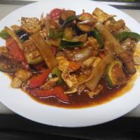 37. Pad Phet · Stir fried Thai eggplant, bamboo shoots, onions, bell pepper, basil and kaffir leaves cooked...