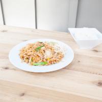 60. Pad Thai · Rice noodles stir-fried in our savory house sauce with onions,  eggs and your choice of prot...