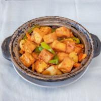 Sizzling Tofu · Lightly fried tofu, water chestnuts, bamboo shoots and vegetables. In a spicy and tangy sauc...