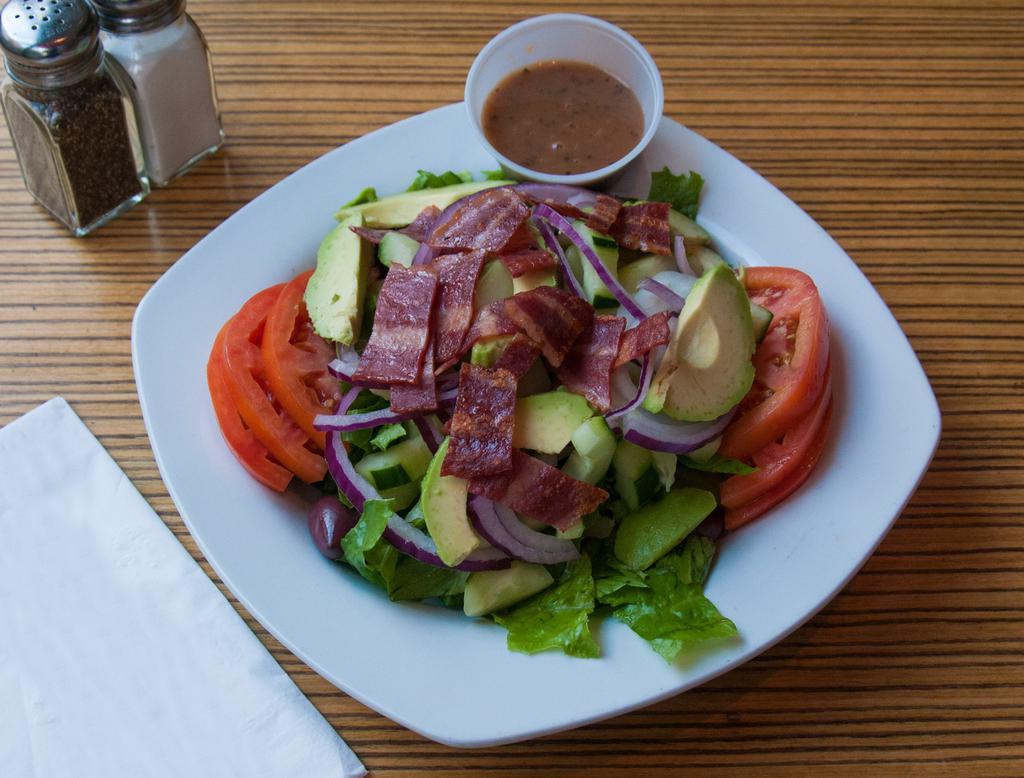 GK Appetizer Salad · Chopped lettuce, avocado, goat cheese, turkey bacon, tomato & onion. Served with mustard vinaigrette dressing