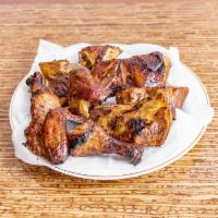1/2 Chicken  · Meat cooked with mesquite wood.