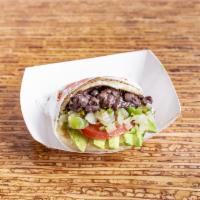 9. Vegetarian Arepas · Avocado, black beans, tomato, peppers, and onion.

