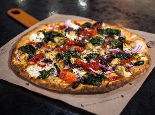 Mediterranean Pizza (700 Cal) · garlic & oil, feta cheese, spinach, sun dried tomato, kalamata olive, artichokes, red onion, topped with mediterranean herbs