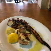 OCTOPUS LEG · ONE CHAR-GRILLED OCTOPUS LEG that has been marinated and char-grilled with olive oil and lem...