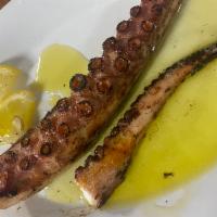 WHOLE OCTOPUS LEG · char-grilled whole octopus leg topped with olive oil and lemon.