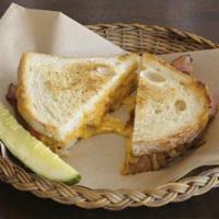Grilled Cheese Sandwich · Melted cheddar and provolone on locally baked white bread. Add a cup of our homemade tomato ...