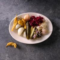 Assorted Seasonal Pickles Plate · A variety of fresh garden vegetables fermented with regional spices. Vegetarian.