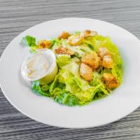 Classic Caesar Salad · Crispy romaine, house-made croutons and Parmesan.