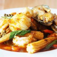 Seafood Pad Cha · Stir-fried shrimp, scallops, squid and mussel with mushrooms and string beans in spicy garli...