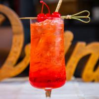 Shirley Temple · Ginger ale, grenadine and cherry.