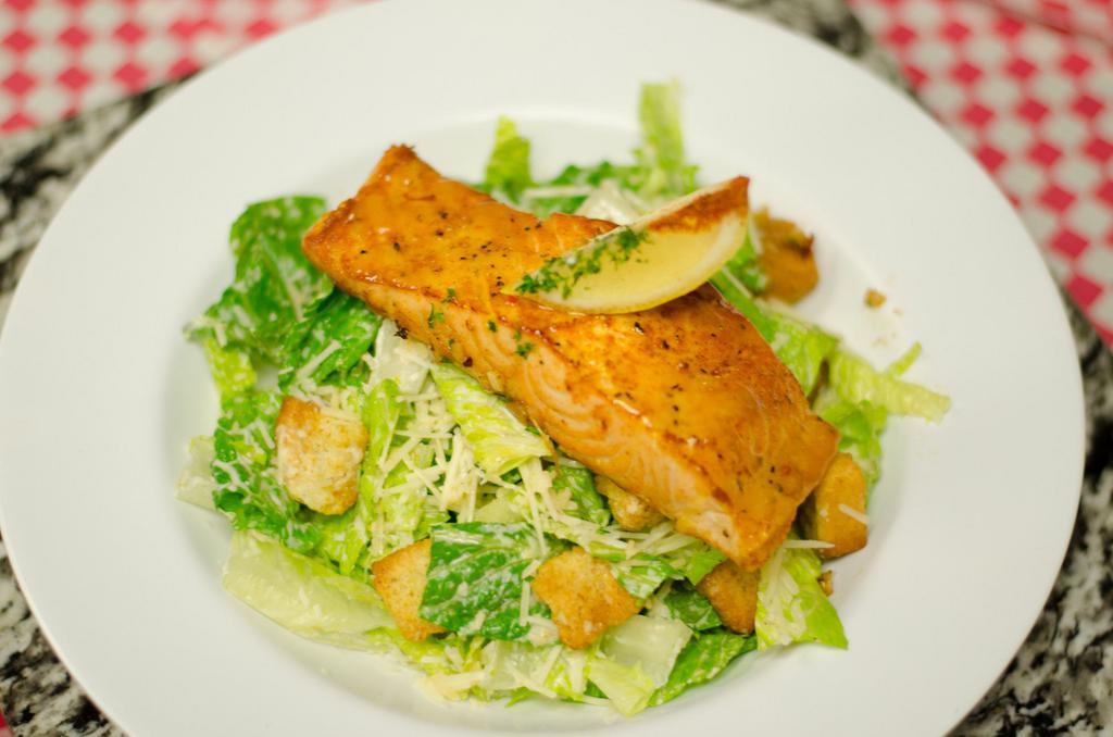 Caesar Salad · Crisp romaine lettuce, Parmesan cheese, croutons and caesar dressing.