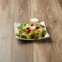Cobb Salad · Iceberg lettuce, tomatoes, black olives, egg, bacon, mozzarella and cheddar cheese.