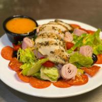Antipasto Salad · Tossed salad with pepperoni, ham, and turkey. Comes with Italian dressing.