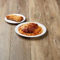 Chicken Parmigiana · Breaded chicken, marinara, cheese and spaghetti.