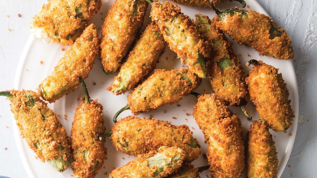 Jalapeno Poppers · Served with crab mix.