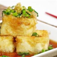 Fried Tofu · 4 pieces deep-fried tofu with ponzu sauce.