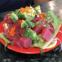 Ahi Poke Bowl · Diced tuna, diced avocado with scallions, and sesame seeds in a spicy Hawaiian sauce.