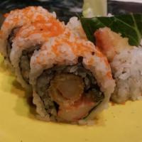 Shrimp Tempura Roll · 5 pieces. Shrimp tempura, crabstick, lettuce topped with masago and eel sauce.